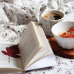 white ceramic bowl on white book page