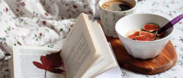 white ceramic bowl on white book page