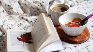 white ceramic bowl on white book page