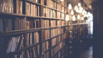 Best horror books to read right now stacked on a shelf